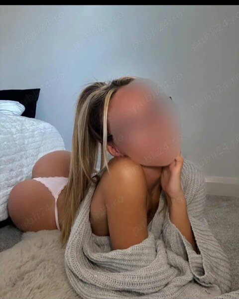 Buna, noua in zona Romancierilor, blonda siliconata.